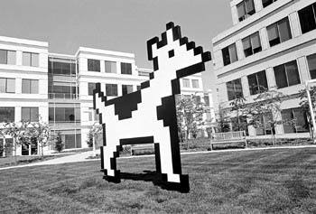 Black and white photo of the Dogcow sculpture at Apple